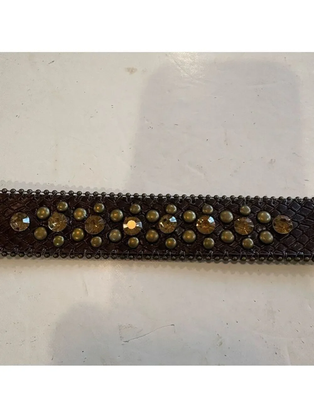 Brown leather belt adorned with amber stones and burnished gold studs. Size 24